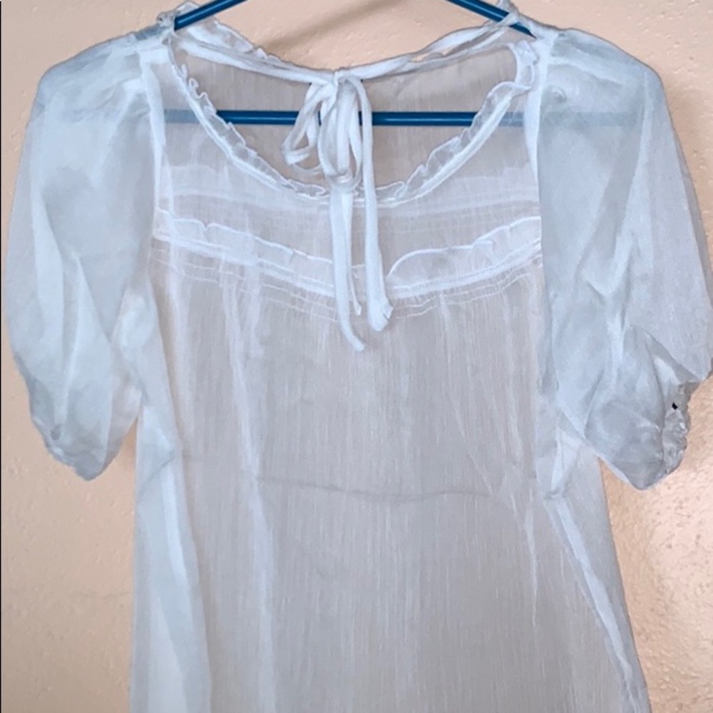 White transparent blouse with puffy sleeves